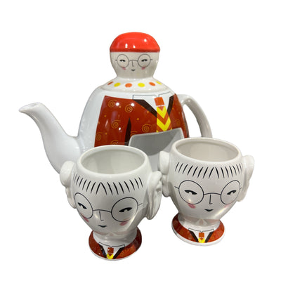 talking head weird teapot man and two cups that tuck into the side of the teapot