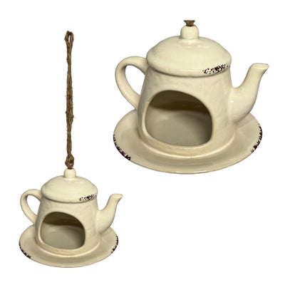 Bird feeder in teapot shape cream glazed with rafia rope hanger